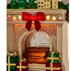 Festive Holiday Fireplace Decor with Red Bow